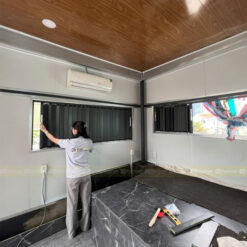 Cửa nhôm xếp gấp cho cửa sổ, ban công che mưa nắng gió to